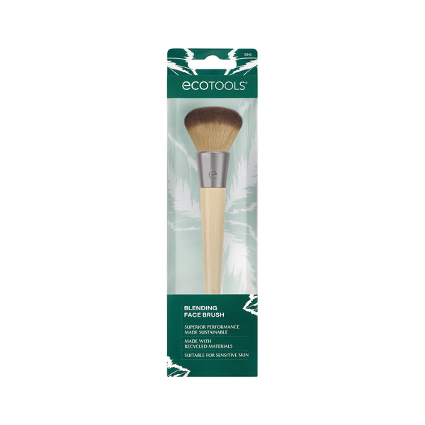Blending face brush in green clear retail packaging, visible brush with soft brown bristles