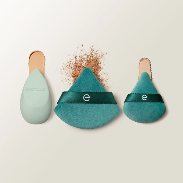 Teal and white makeup sponge set with one large and two smaller triangular sponges