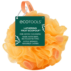 Orange lathering bath sponge with ECOTOOLS hanging tag, fruit-flower mesh.