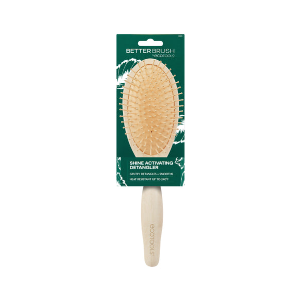 Shine Activating Detangler hair brush shown with branding on the package card
