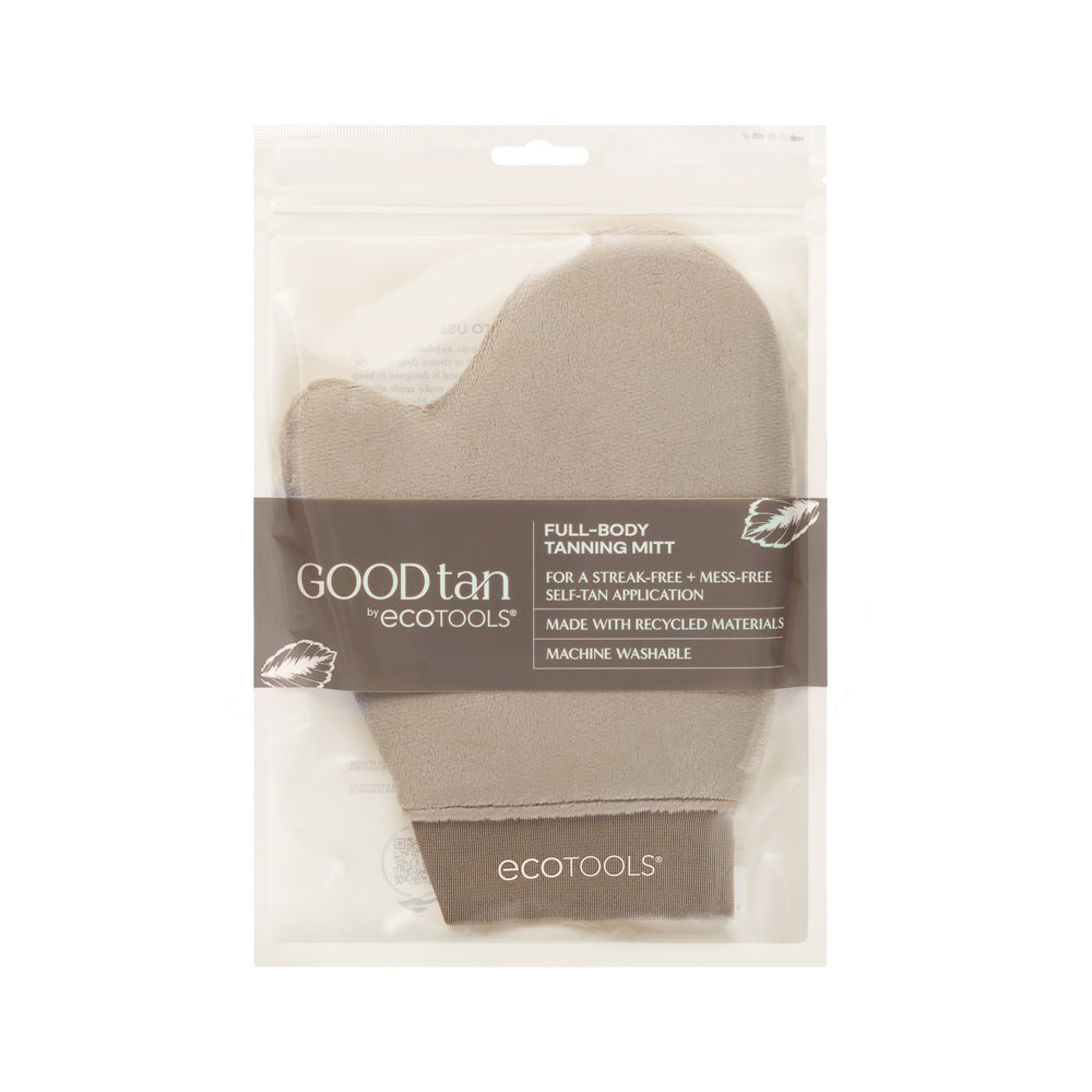 Beige full-body tanning mitt with terry cloth texture and thumb opening
