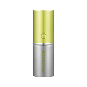 Retractable face brush with lime green top cap and silver base