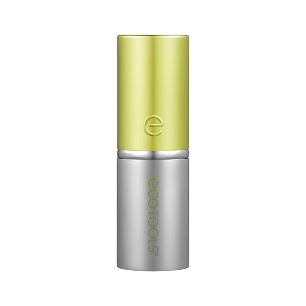 Retractable face brush with lime green top cap and silver base