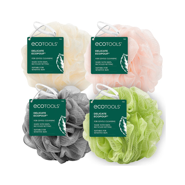 EcoPouf® bath sponge set of four with green hang tags on ruffled mesh