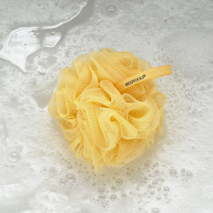 Yellow delicate EcoPouf exfoliating bath sponge with mesh flower design
