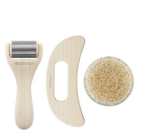 Self-care kit with wooden roller, brush, and round exfoliating scrub pad