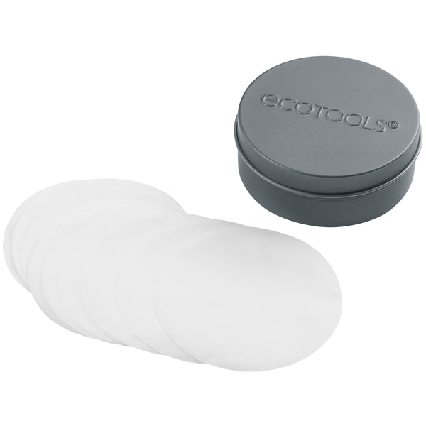 Stack of white dissolvable cleansing sheets with gray EcoTools tin lid