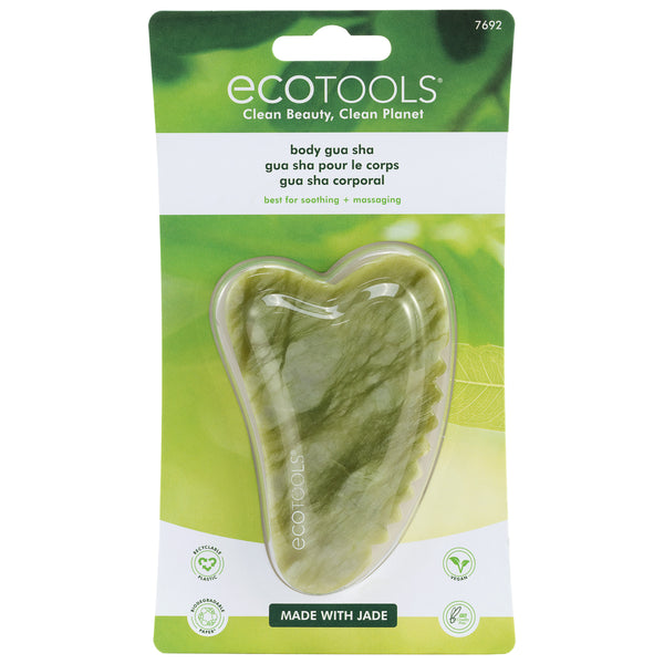 Jade gua sha stone tool in retail blister pack, heart-shaped with scalloped edge