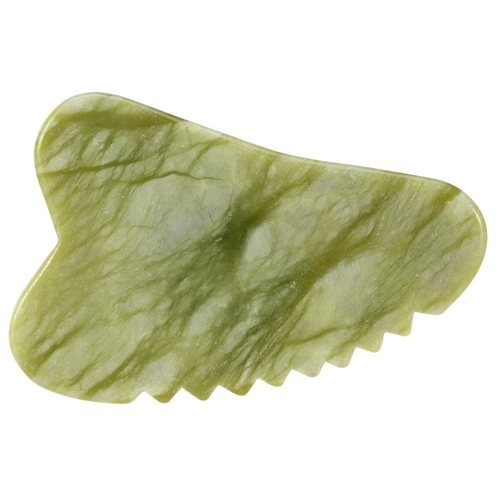 Green jade gua sha stone with wavy shape and scalloped edge