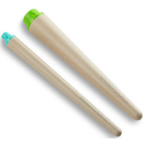Interchangeable makeup brush handles with green and teal end caps on beige stems