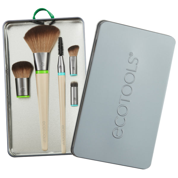 Interchangeable face makeup brush kit with five brushes in open silver case