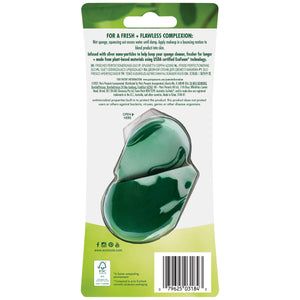 Blister pack backing showing two green-and-white teardrop facial sponges.