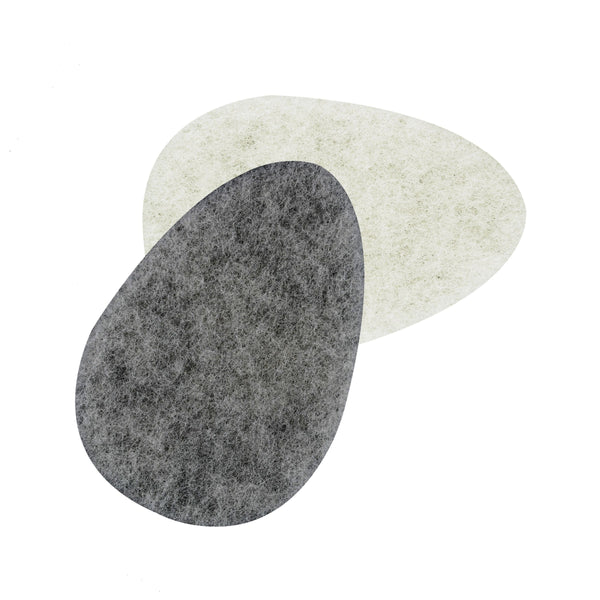 Two infused facial sponges, light beige and dark gray overlapping teardrop pads