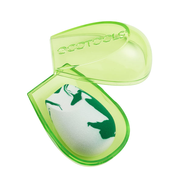 Teardrop green-and-white marble makeup sponge blender in a lime travel case