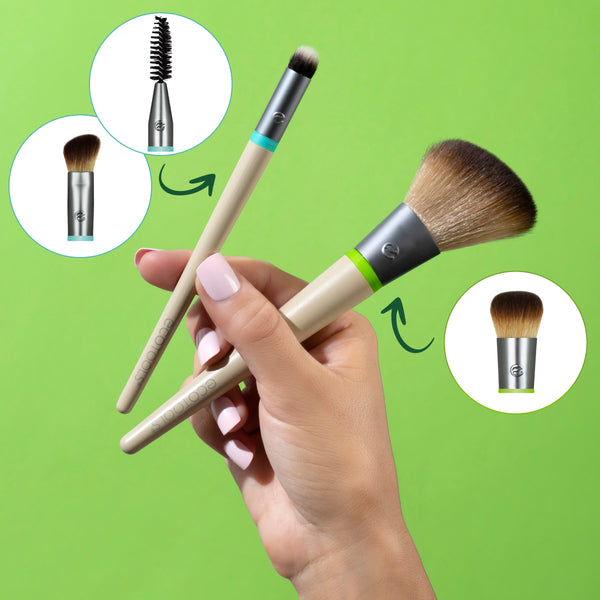 Face makeup brush set held in hand, includes fluffy foundation brush and spoolie