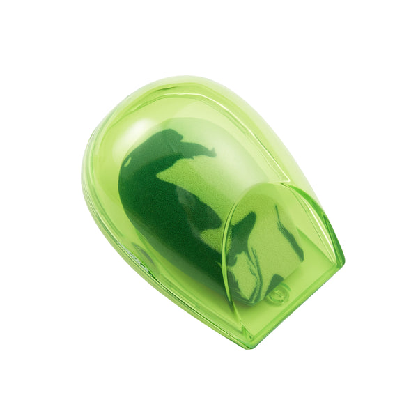 Lime green travel case with embedded green-and-white teardrop makeup sponge