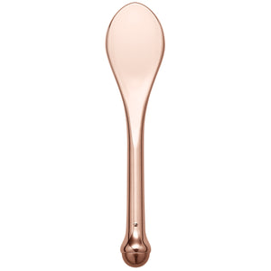 Rose-gold handheld massage tool with smooth oval handle