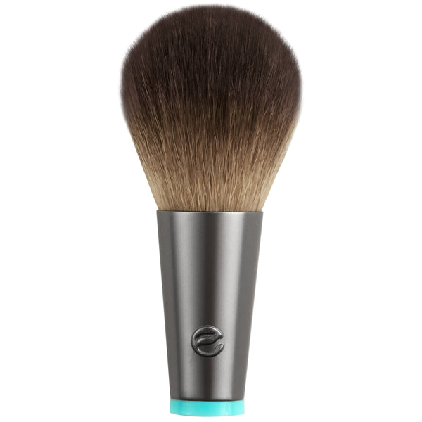 Interchangeable cheek brush head with rounded brown bristles, gray base, teal collar