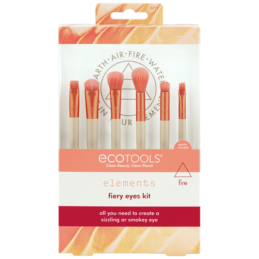 Eye makeup brush set with six peach bristles and beige handles, plus one spoolie wand