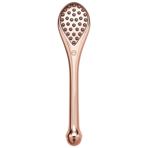Rose-gold handheld massage tool with textured knob head