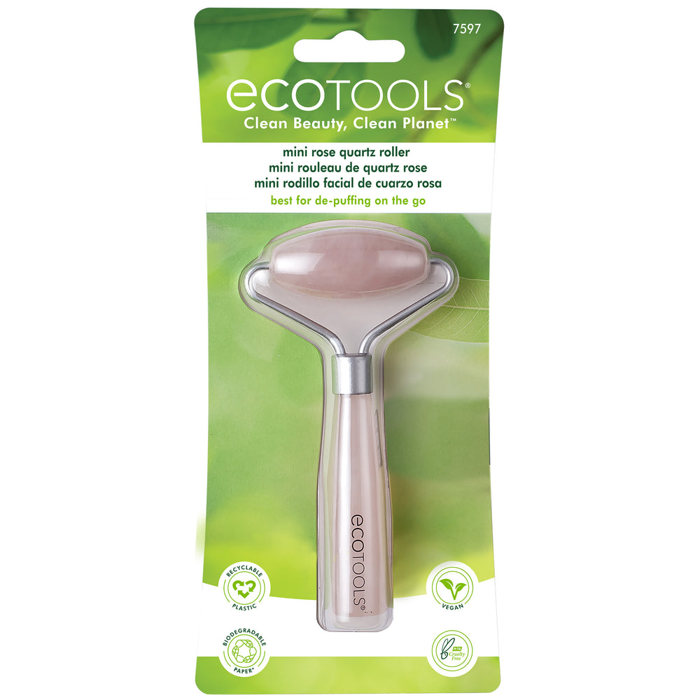 Mini rose quartz facial roller with pink stone head and silver metal handle.